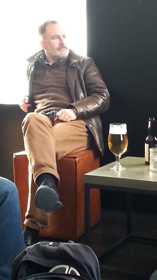 Picture of Guy relaxing with a beer